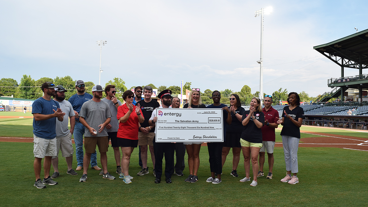 Entergy Mississippi presented a check to the Salvation Army before the Mississippi Braves game on July 29.